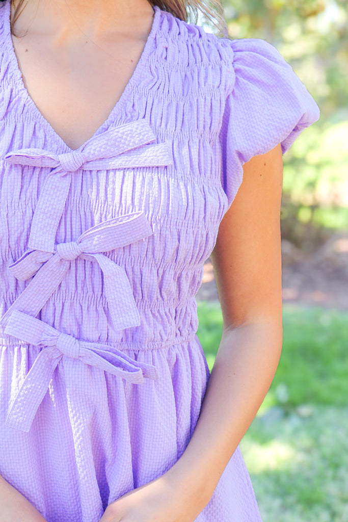 puff sleeve of bow front smocked dress in lavender