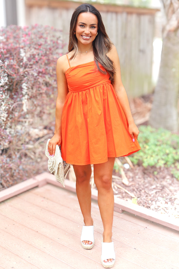 orange pleated bust tie back mini dress