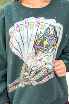 Spooky Season Skeleton Card Sweatshirt by Queen of Sparkles - close-up of skeleton card design