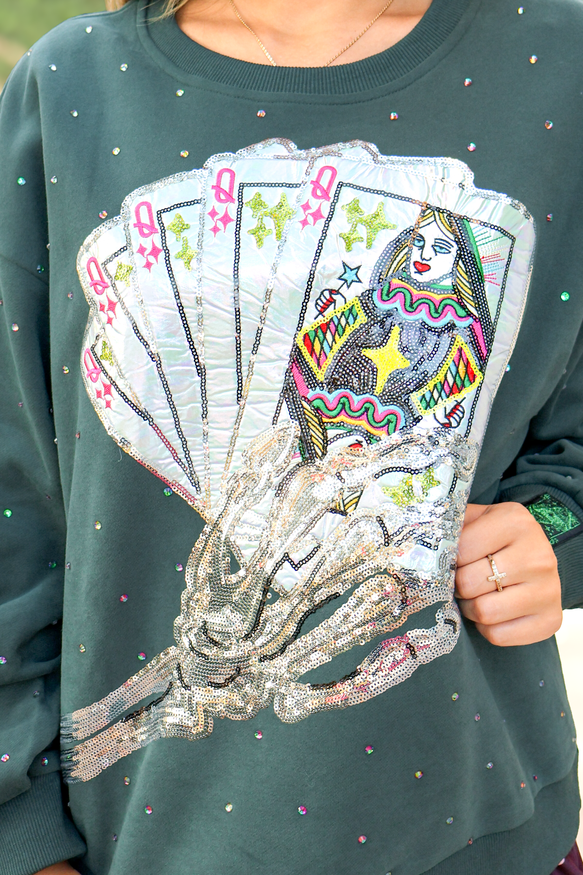 Spooky Season Skeleton Card Sweatshirt by Queen of Sparkles - close-up of skeleton card design