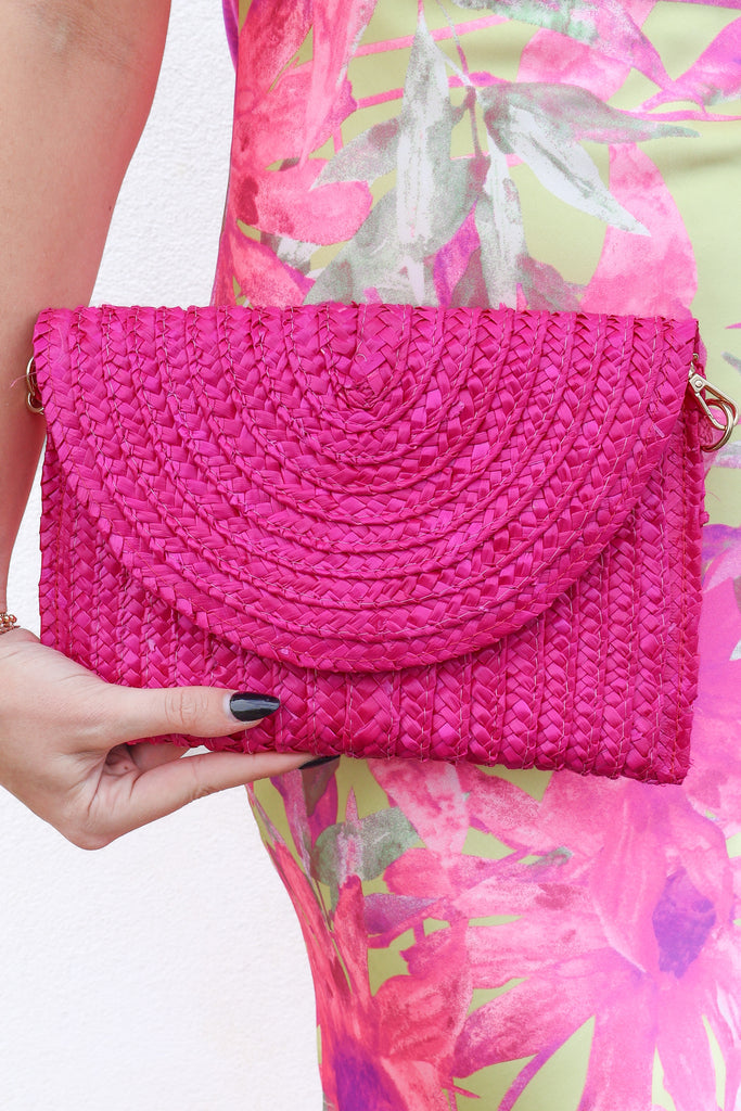 fuchsia straw crossbody clutch