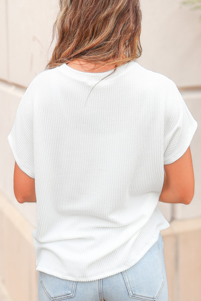 back of white textured pocket front top
