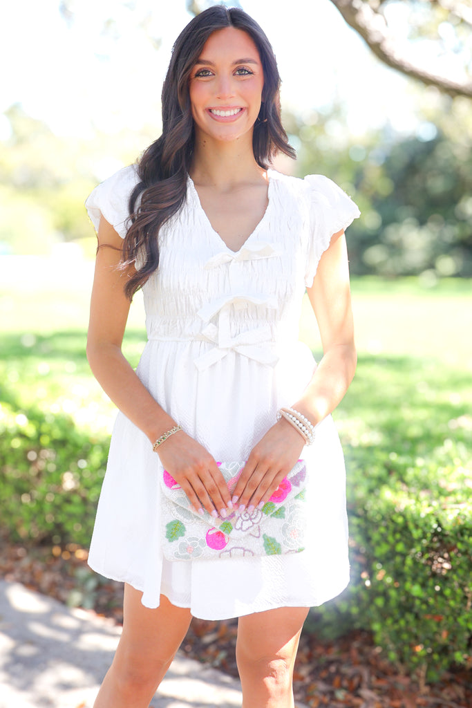 bow front smocked puff sleeve dress in white