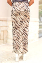 Side view of the tiger print mesh maxi skirt