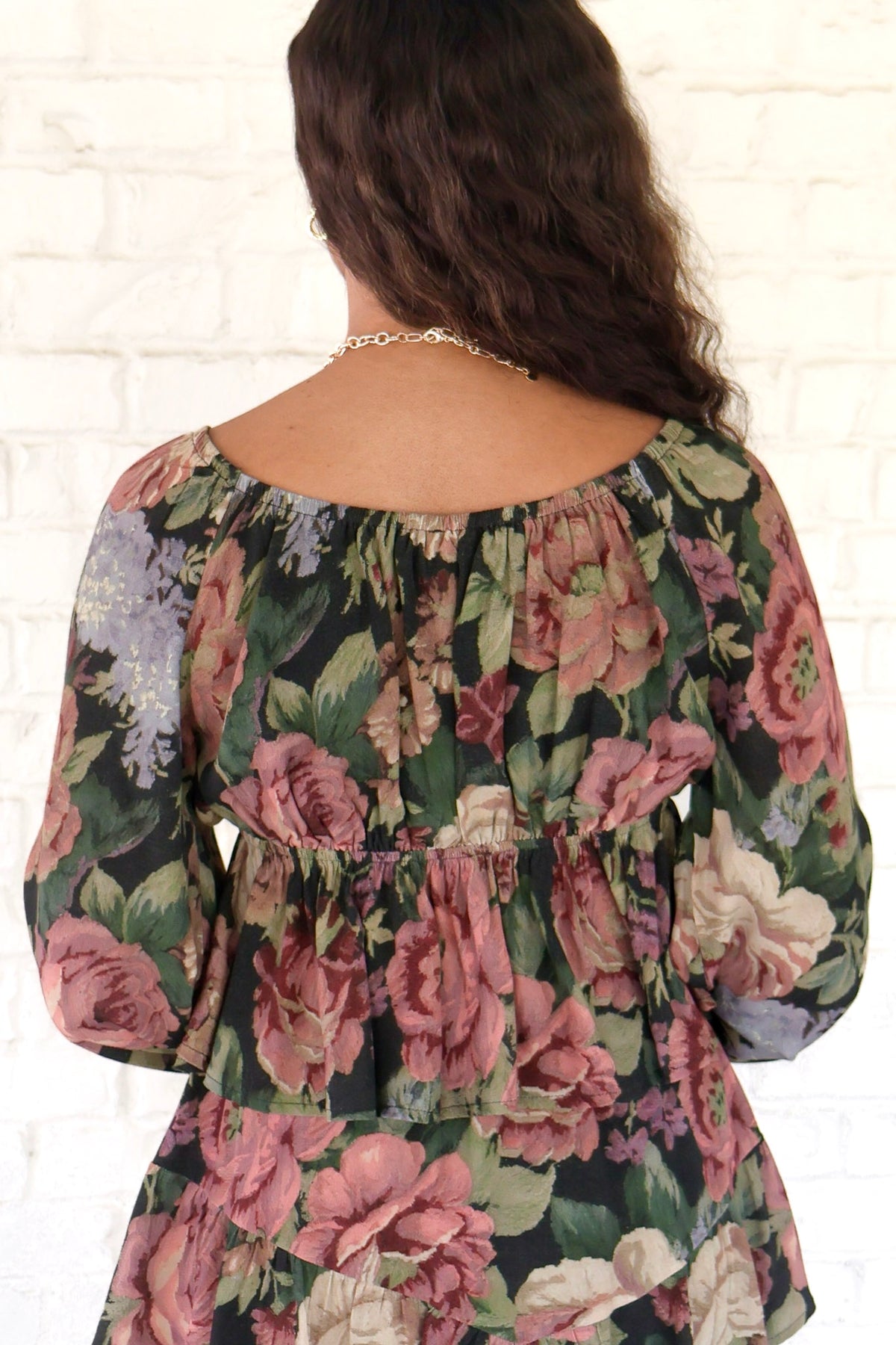 Falling Into Place Floral Flutter Sleeve Top in Black - back view